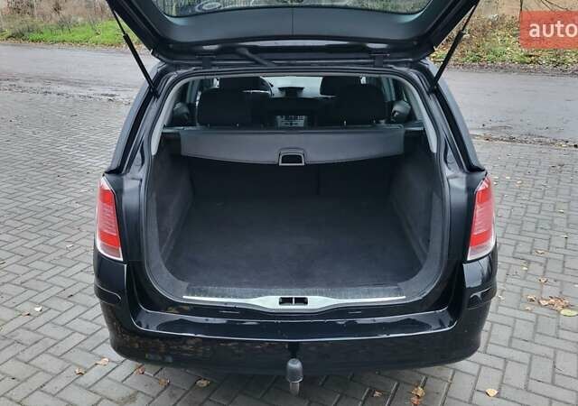 Черный Опель Астра, объемом двигателя 1.8 л и пробегом 165 тыс. км за 5650 $, фото 37 на Automoto.ua