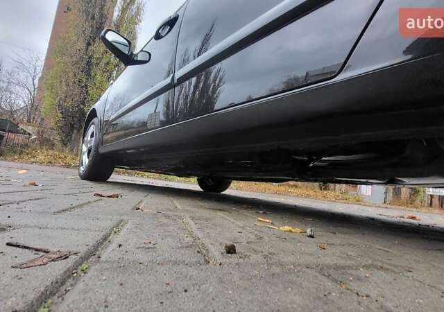 Черный Опель Астра, объемом двигателя 1.8 л и пробегом 165 тыс. км за 5650 $, фото 5 на Automoto.ua