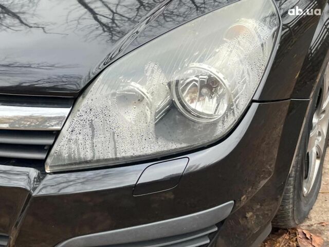 Черный Опель Астра, объемом двигателя 1.6 л и пробегом 340 тыс. км за 5140 $, фото 4 на Automoto.ua