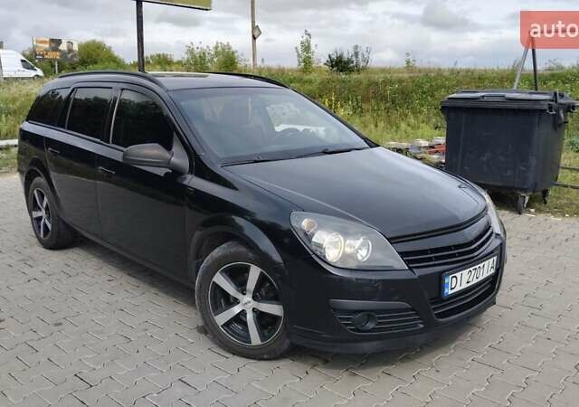 Чорний Опель Астра, об'ємом двигуна 1.2 л та пробігом 340 тис. км за 3900 $, фото 9 на Automoto.ua