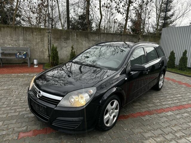 Черный Опель Астра, объемом двигателя 1.9 л и пробегом 286 тыс. км за 2050 $, фото 5 на Automoto.ua