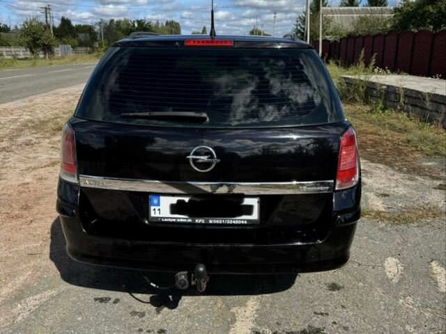 Черный Опель Астра, объемом двигателя 1.6 л и пробегом 248 тыс. км за 5200 $, фото 5 на Automoto.ua