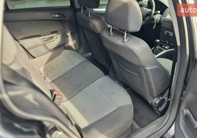 Черный Опель Астра, объемом двигателя 1.6 л и пробегом 264 тыс. км за 4700 $, фото 7 на Automoto.ua