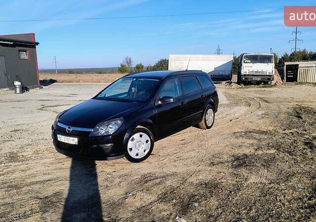 Черный Опель Астра, объемом двигателя 1.8 л и пробегом 245 тыс. км за 4900 $, фото 26 на Automoto.ua
