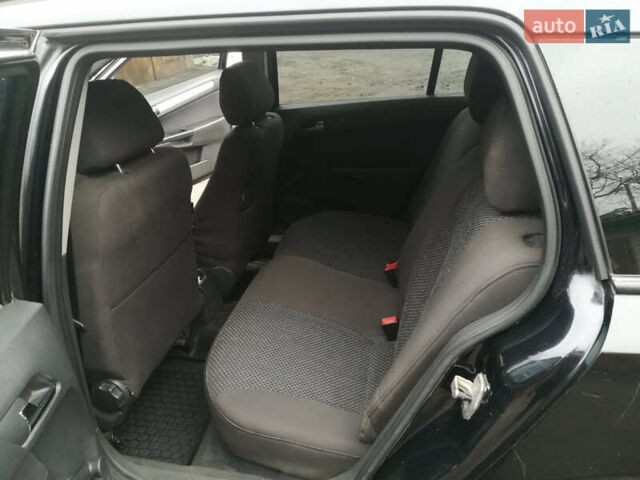 Черный Опель Астра, объемом двигателя 1.3 л и пробегом 163 тыс. км за 4900 $, фото 5 на Automoto.ua