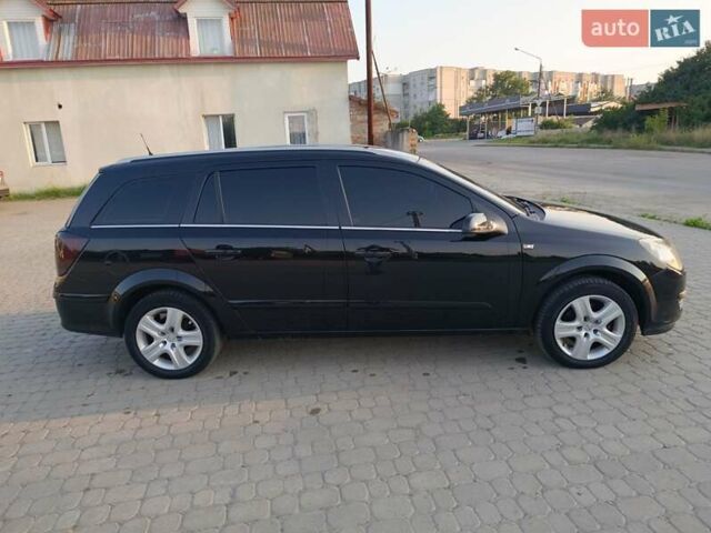 Черный Опель Астра, объемом двигателя 1.6 л и пробегом 230 тыс. км за 4300 $, фото 7 на Automoto.ua