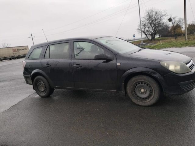 Черный Опель Астра, объемом двигателя 1.2 л и пробегом 300 тыс. км за 3800 $, фото 3 на Automoto.ua