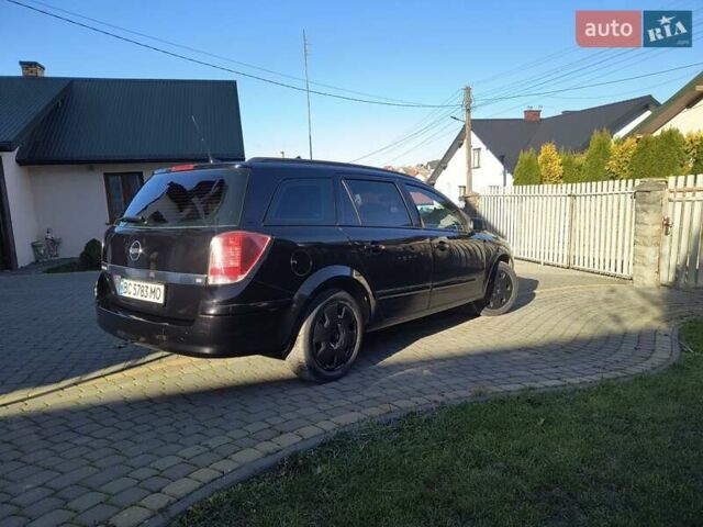 Черный Опель Астра, объемом двигателя 1.8 л и пробегом 245 тыс. км за 4900 $, фото 22 на Automoto.ua