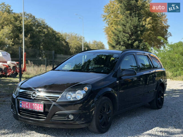 Черный Опель Астра, объемом двигателя 1.6 л и пробегом 241 тыс. км за 5700 $, фото 8 на Automoto.ua