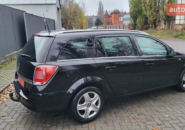 Черный Опель Астра, объемом двигателя 1.8 л и пробегом 165 тыс. км за 5650 $, фото 10 на Automoto.ua