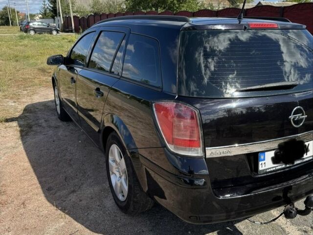 Черный Опель Астра, объемом двигателя 1.6 л и пробегом 248 тыс. км за 5200 $, фото 2 на Automoto.ua