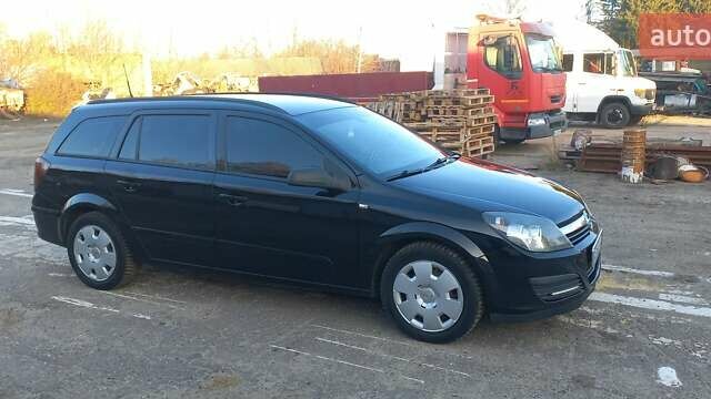 Черный Опель Астра, объемом двигателя 1.8 л и пробегом 260 тыс. км за 5200 $, фото 20 на Automoto.ua