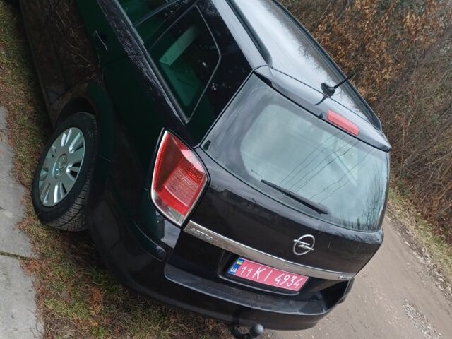 Черный Опель Астра, объемом двигателя 1.6 л и пробегом 243 тыс. км за 5498 $, фото 1 на Automoto.ua