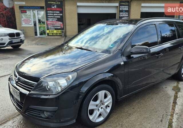 Черный Опель Астра, объемом двигателя 1.6 л и пробегом 264 тыс. км за 4700 $, фото 6 на Automoto.ua