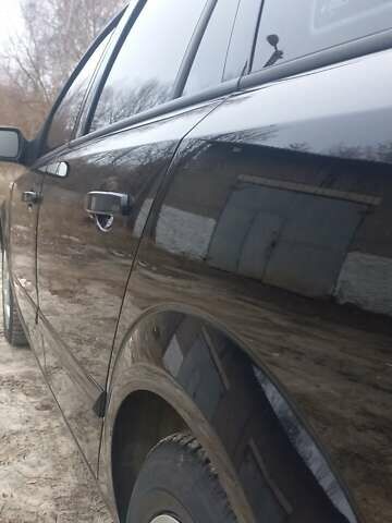 Черный Опель Астра, объемом двигателя 1.8 л и пробегом 260 тыс. км за 5200 $, фото 24 на Automoto.ua