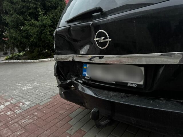 Черный Опель Астра, объемом двигателя 1.9 л и пробегом 311 тыс. км за 2930 $, фото 11 на Automoto.ua