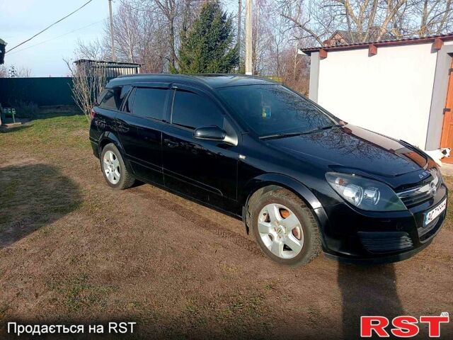 Черный Опель Астра, объемом двигателя 1.6 л и пробегом 265 тыс. км за 5700 $, фото 2 на Automoto.ua