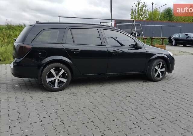 Чорний Опель Астра, об'ємом двигуна 1.2 л та пробігом 340 тис. км за 3900 $, фото 13 на Automoto.ua