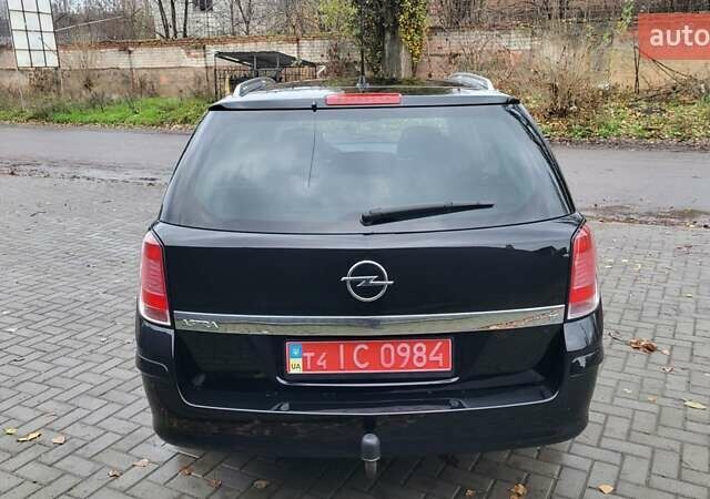 Черный Опель Астра, объемом двигателя 1.8 л и пробегом 165 тыс. км за 5650 $, фото 9 на Automoto.ua