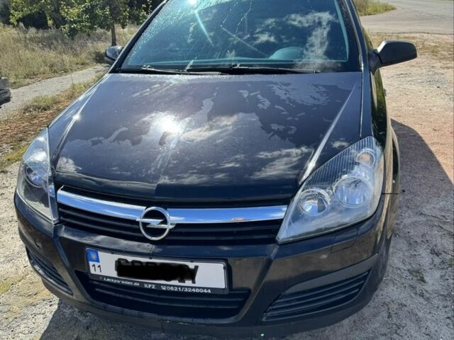 Черный Опель Астра, объемом двигателя 1.6 л и пробегом 248 тыс. км за 5200 $, фото 1 на Automoto.ua