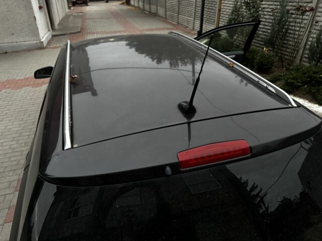 Черный Опель Астра, объемом двигателя 1.9 л и пробегом 311 тыс. км за 2930 $, фото 4 на Automoto.ua