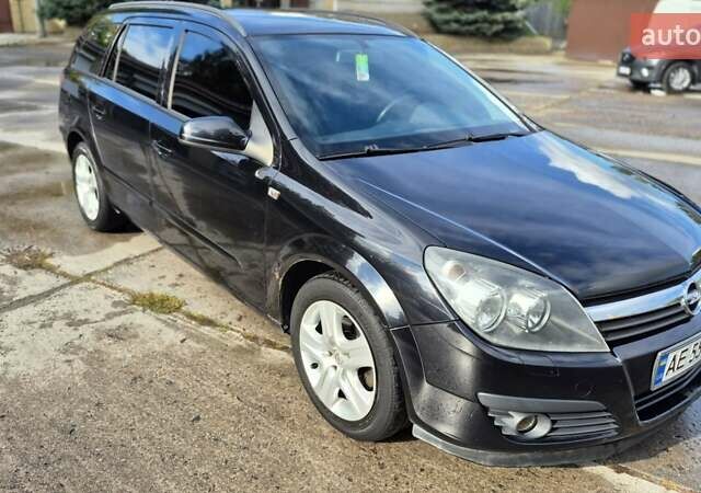 Черный Опель Астра, объемом двигателя 1.6 л и пробегом 264 тыс. км за 4700 $, фото 13 на Automoto.ua