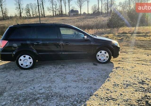 Черный Опель Астра, объемом двигателя 1.8 л и пробегом 245 тыс. км за 4900 $, фото 29 на Automoto.ua