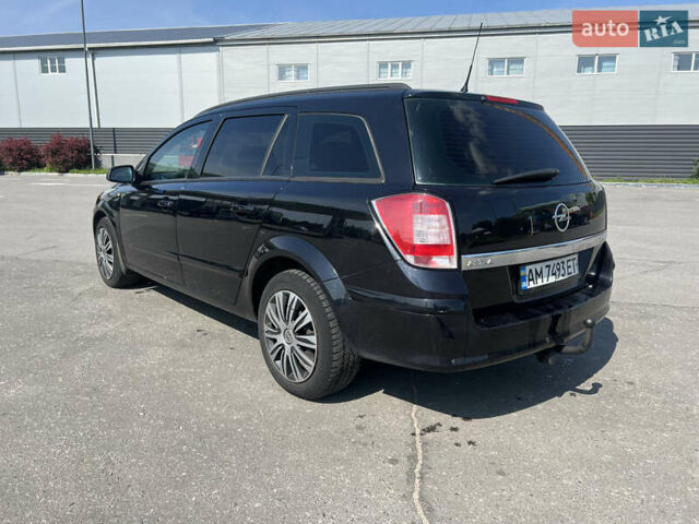 Черный Опель Астра, объемом двигателя 1.6 л и пробегом 208 тыс. км за 4000 $, фото 6 на Automoto.ua