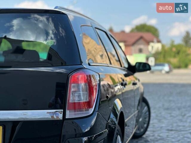 Черный Опель Астра, объемом двигателя 1.6 л и пробегом 196 тыс. км за 4850 $, фото 6 на Automoto.ua