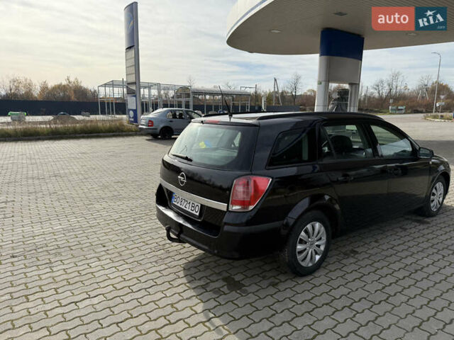 Черный Опель Астра, объемом двигателя 1.69 л и пробегом 420 тыс. км за 5500 $, фото 17 на Automoto.ua