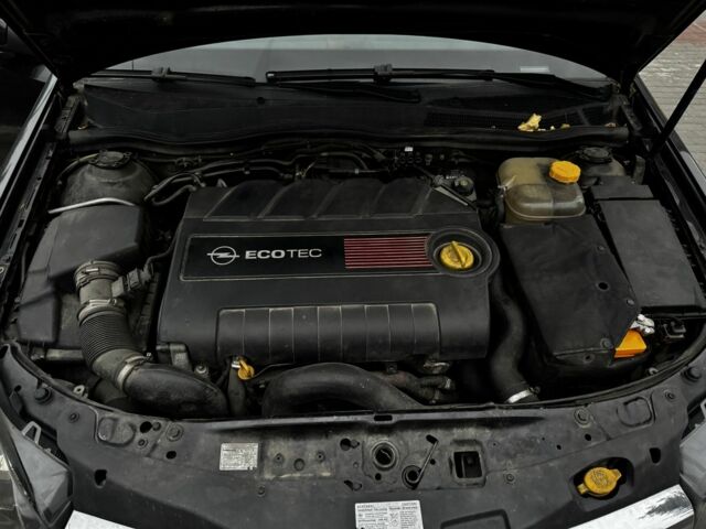 Черный Опель Астра, объемом двигателя 1.9 л и пробегом 311 тыс. км за 2930 $, фото 3 на Automoto.ua