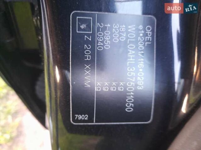 Черный Опель Астра, объемом двигателя 1.8 л и пробегом 215 тыс. км за 4800 $, фото 12 на Automoto.ua
