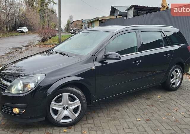 Черный Опель Астра, объемом двигателя 1.8 л и пробегом 165 тыс. км за 5650 $, фото 3 на Automoto.ua