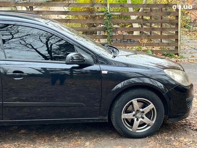 Черный Опель Астра, объемом двигателя 1.6 л и пробегом 340 тыс. км за 5140 $, фото 13 на Automoto.ua