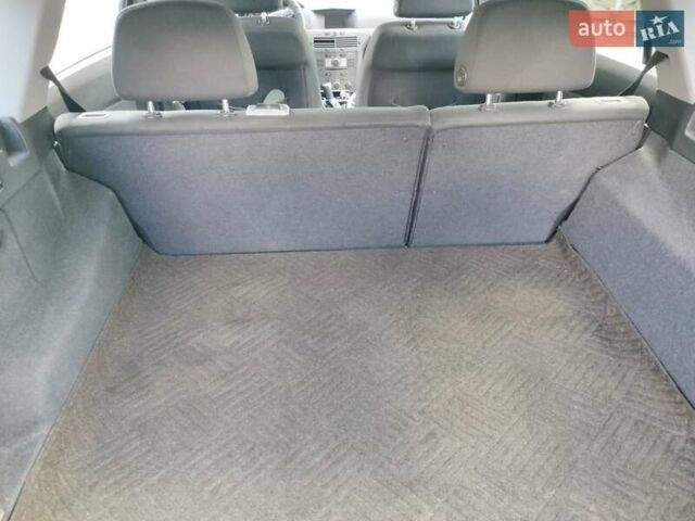 Черный Опель Астра, объемом двигателя 1.3 л и пробегом 268 тыс. км за 4550 $, фото 6 на Automoto.ua