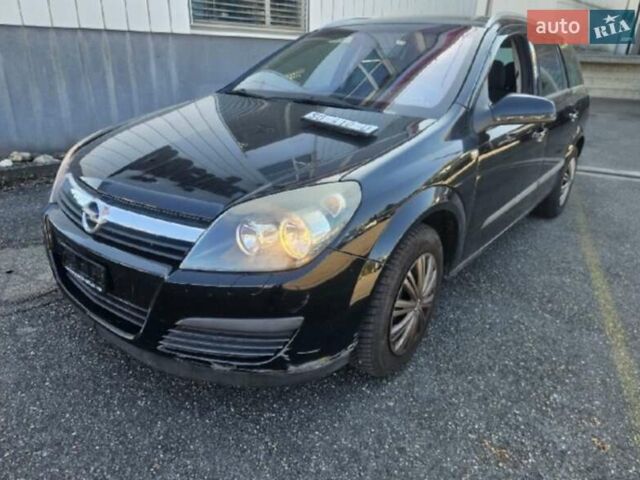 Черный Опель Астра, объемом двигателя 1.8 л и пробегом 223 тыс. км за 6500 $, фото 4 на Automoto.ua