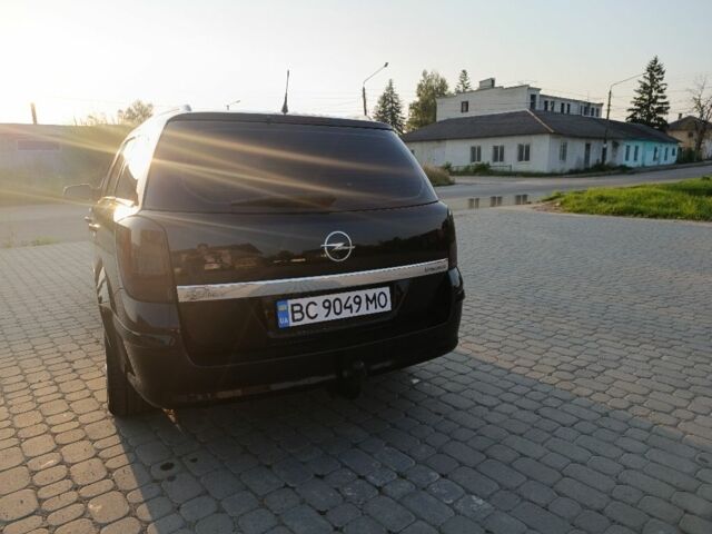 Черный Опель Астра, объемом двигателя 1.6 л и пробегом 230 тыс. км за 3900 $, фото 4 на Automoto.ua