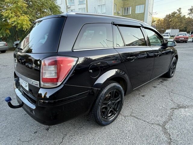 Черный Опель Астра, объемом двигателя 1.7 л и пробегом 230 тыс. км за 3999 $, фото 3 на Automoto.ua