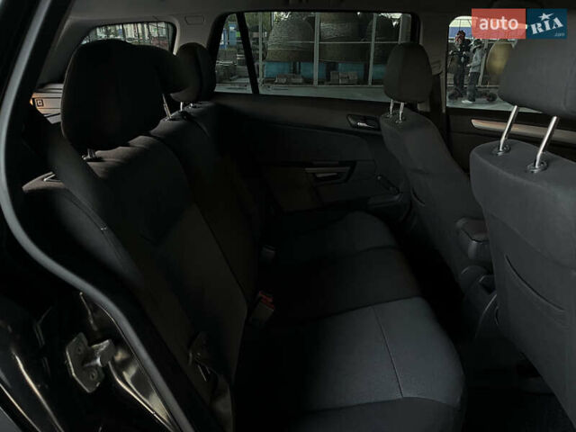 Черный Опель Астра, объемом двигателя 1.6 л и пробегом 207 тыс. км за 4999 $, фото 30 на Automoto.ua