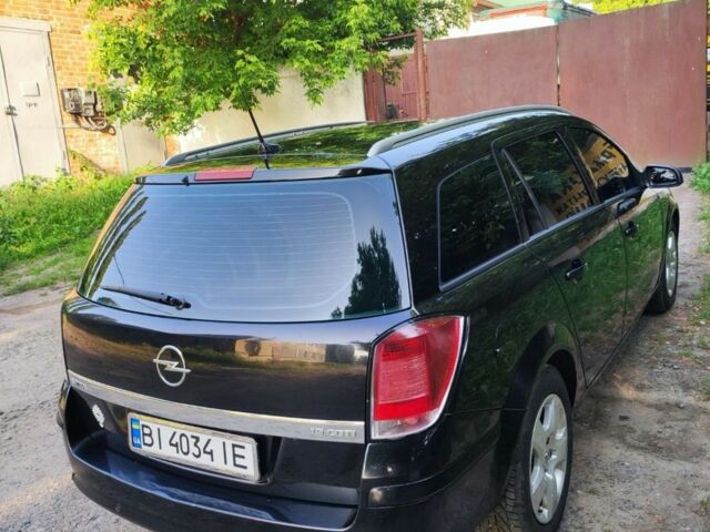 Черный Опель Астра, объемом двигателя 1.9 л и пробегом 216 тыс. км за 4700 $, фото 1 на Automoto.ua