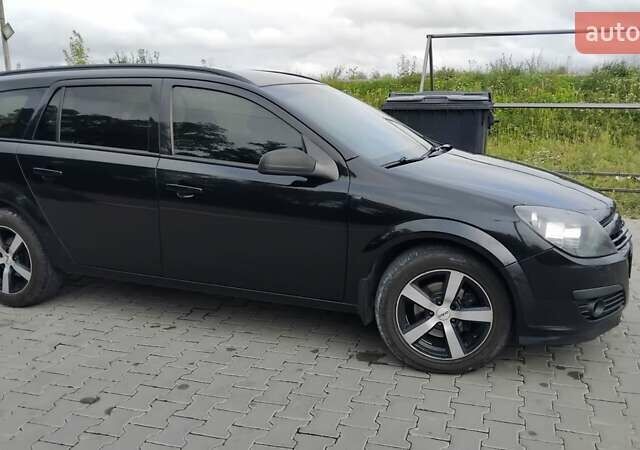 Чорний Опель Астра, об'ємом двигуна 1.2 л та пробігом 340 тис. км за 3900 $, фото 16 на Automoto.ua
