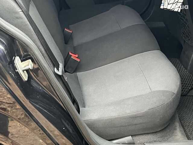 Черный Опель Астра, объемом двигателя 1.6 л и пробегом 340 тыс. км за 5140 $, фото 20 на Automoto.ua