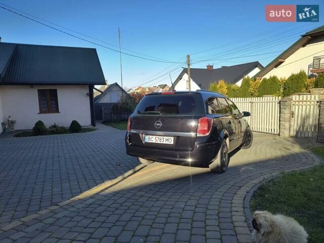 Черный Опель Астра, объемом двигателя 1.8 л и пробегом 245 тыс. км за 4900 $, фото 10 на Automoto.ua