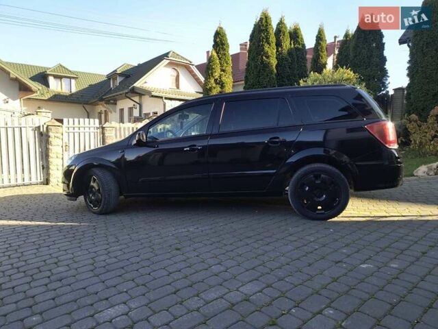 Черный Опель Астра, объемом двигателя 1.8 л и пробегом 245 тыс. км за 4900 $, фото 9 на Automoto.ua