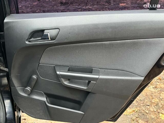 Черный Опель Астра, объемом двигателя 1.6 л и пробегом 340 тыс. км за 5140 $, фото 21 на Automoto.ua