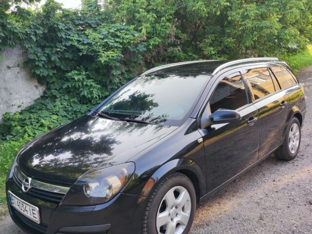 Черный Опель Астра, объемом двигателя 1.9 л и пробегом 216 тыс. км за 4700 $, фото 3 на Automoto.ua