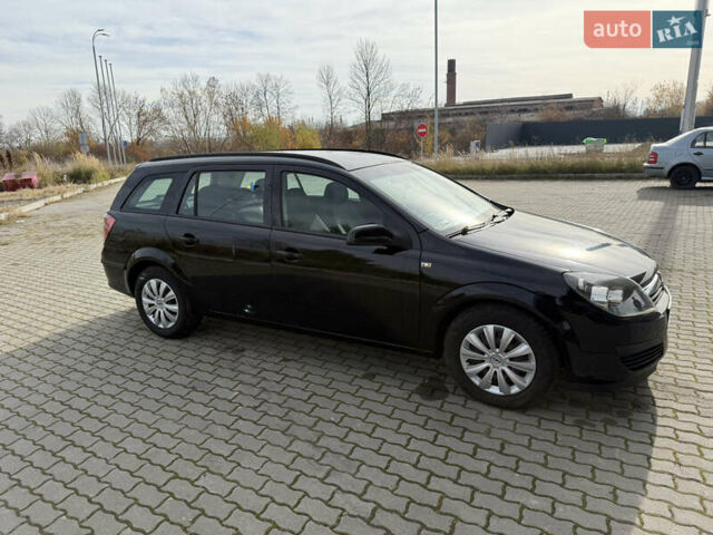 Черный Опель Астра, объемом двигателя 1.69 л и пробегом 420 тыс. км за 5500 $, фото 13 на Automoto.ua