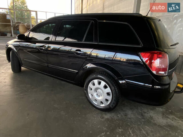 Черный Опель Астра, объемом двигателя 1.6 л и пробегом 207 тыс. км за 4999 $, фото 7 на Automoto.ua