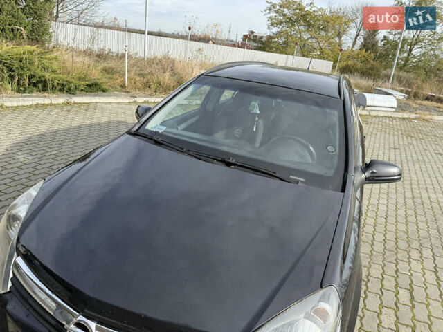 Черный Опель Астра, объемом двигателя 1.69 л и пробегом 420 тыс. км за 5500 $, фото 4 на Automoto.ua