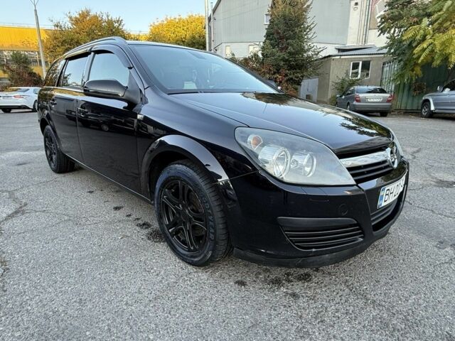 Черный Опель Астра, объемом двигателя 1.7 л и пробегом 230 тыс. км за 3999 $, фото 1 на Automoto.ua